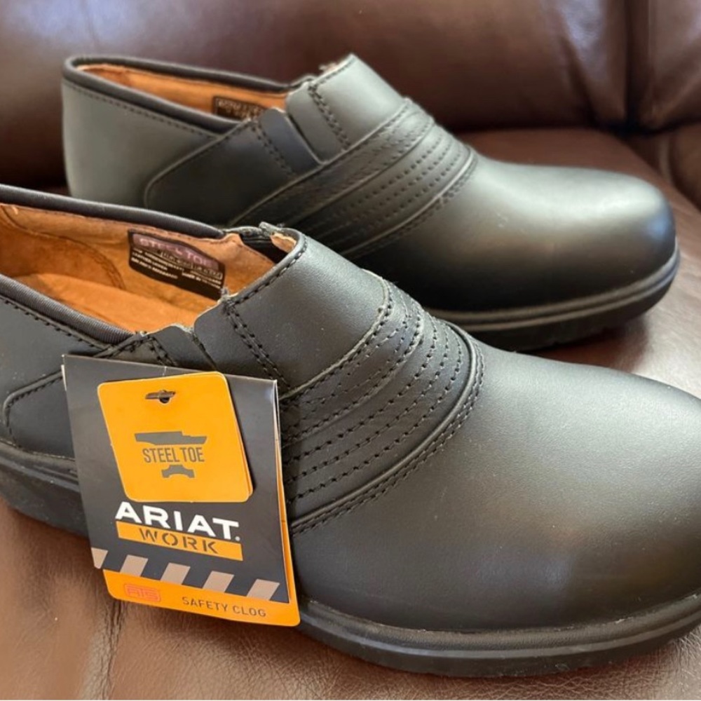 Women’s steel toed work shoes. New with tags and box.size 9.